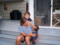 Playing in Nana and Grandpa's backyard with Uncle Brad