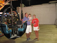 Alex, Shannon and Daddy at the boardwalk in Point Pleasant