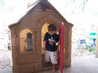 August 2006 Photos: Alex and Max in the playhouse.