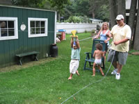 August 2006 Photos: Alex, Skye and Dane playing in their wonderful backyard.