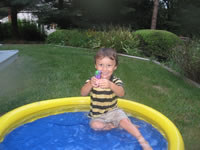 August 2006 Photos: Alex in the baby pool.