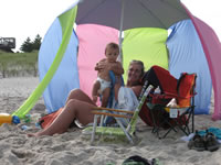 August 2006 Photos: Jill and Max lounging on the beach in Barnegat Light.