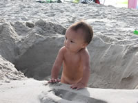 August 2006 Photos: Max playing in the hole that Chris DeMerrit and Alex dug.