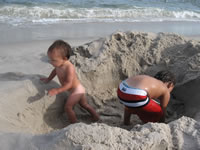 August 2006 Photos: Alex and Max playing in the big hole.