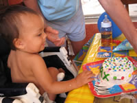 Max's first birthday: Max with his first birthday cake.