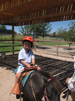 August 2006 Photos: Alex's ride on Misty the pony at Tamaya.