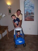 October 2006: Alex, Max and Chris taking a spin around the house