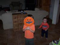 October 2006: Alex made a pumpkin mask in pre-school on Halloween.