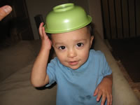 October 2006: Max likes anything he can use as a hat