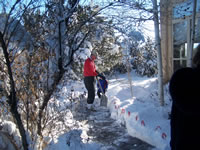 December 2006: Grandpa shoveling snow