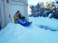 December 2006: Chris testing the sled run he built on the driveway