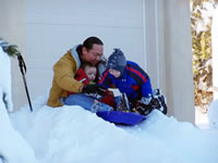 December 2006: Chris, Alex and Max going down the sled run together