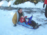 December 2006: Chris, Alex and Max going down the sled run together