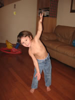 December 2006: Alex being an airplane.