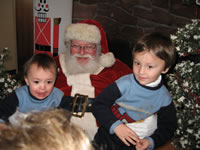 December 2006: Max wasn't too happy about sitting on Santas lap!