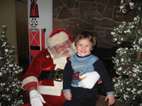 December 2006: Alex and Santa (brunch at Four Hills)