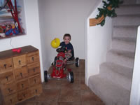 January 2007: Max riding the pedal car.