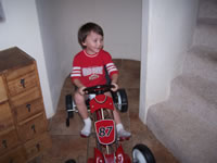 January 2007: Alex riding his pedal car.