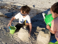 February 2007: Max and Alex had so much fun building and knocking down sand castles.