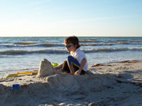 February 2007: Alex played in the sand for hours every day we were in Naples, except maybe two or three when we didn't go to the beach.