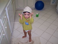 February 2007: Max was cracking me up with his hat and sunglasses. He loved putting them on and walking around the house. 