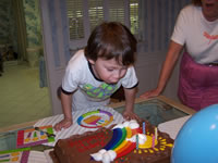 February 2007: Alex blowing out four candles a few days in advance of his 'real' birthday.