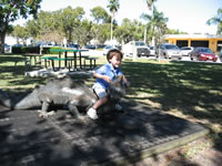 February 2007: Alex on the dragon at our favorite park in Naples.