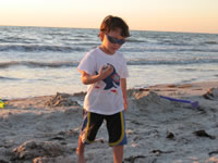 February 2007: Alex on the beach around sunset.