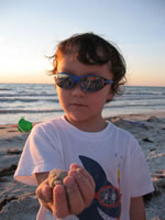 February 2007: Alex offering me some sand.