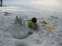 February 2007: Alex making a dribble castle.