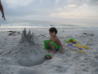 February 2007: Alex making a dribble castle.