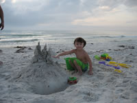 February 2007: Alex making a dribble castle.