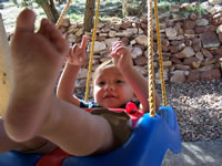 March 2007: Max swinging on the back porch.