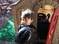 March 2007: Alex playing house dressed as Darth Vader.