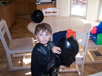 March 2007: Playing in the Darth Vader costume.