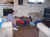 March 2007: Playing trains with Poppa.