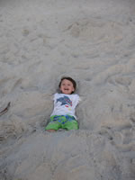 March 2007: Alex partly buried in the sand.