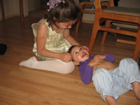 May 2007: Holly tickling Max