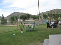 May 2007: Chris playing ball with Alex and Max after his softball game in Albuquerque.