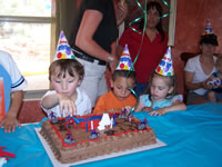 June 2007: Alex and friends enjoying his spiderman cake.