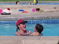 Sept 2007: Cyndi and Max playing in the pool at Tamaya