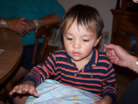 Sept 2007: Max in Window Rock opening some belated birthday gifts from the family