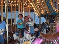 Sept 2007: Cyndi and Alex on the merry-go-round.