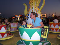 Sept 2007: Max and Cyndi on the teacups at the Nm State Fair.