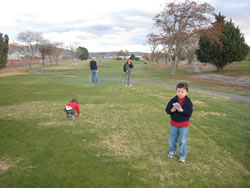 December 2007: Golfing at Los Altos, Alex with score card.