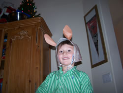 January 2008: Alex wearing the horse hat he made for his school's Christmas musical program.