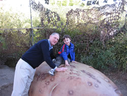 February 2008: Grandpa and Alex with a huge potato at the Botanical Garden.