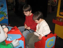 February 2008: Alex and Max at Chuck E. Cheese's.