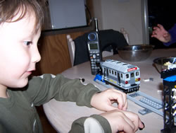 March 2008: Alex got a Spiderman Lego set for his birthday. This is the "Train Rescue" with Doc Ock. His ability to concentrate on building these things amazes me!