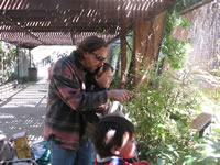 May 2008: Uncle Brad, Alex and Max observing an African feline (cervil?) at the Albuqueque Zoo. Alex especially loved Uncle Brad reading to him about all the animals. We had a wonderful afternoon!